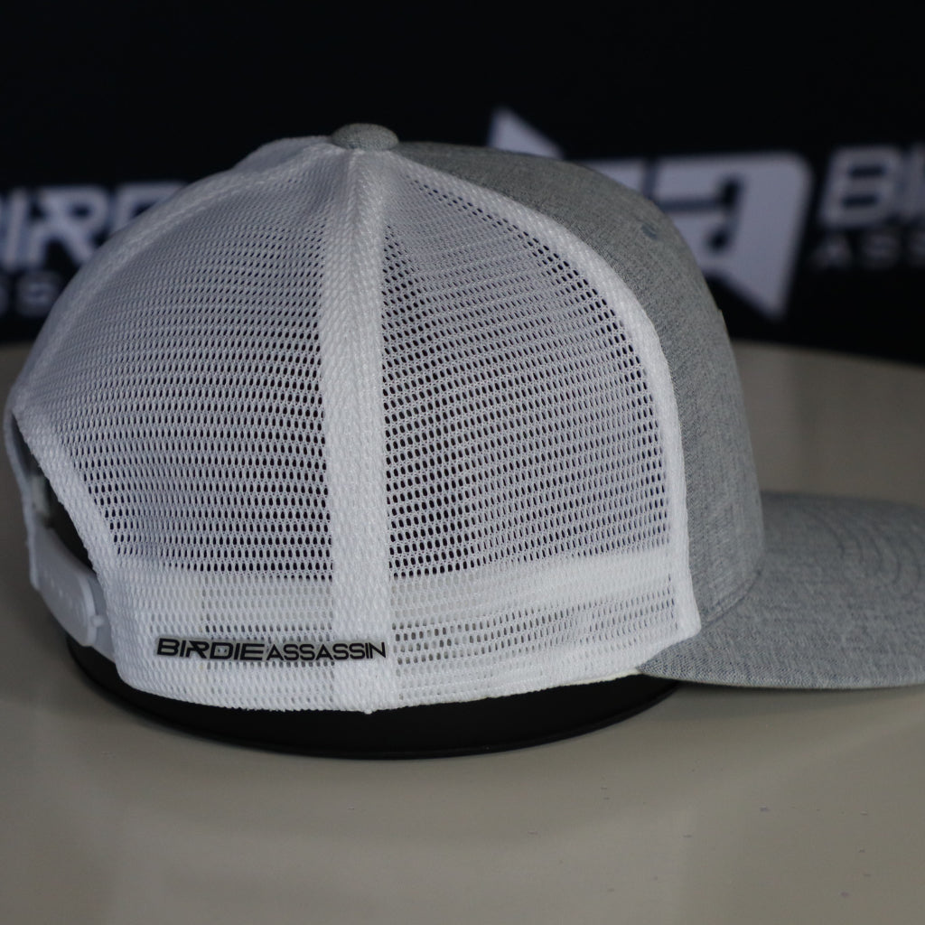 Grey-White Birdie Assassin tour golf cap with badge on the side